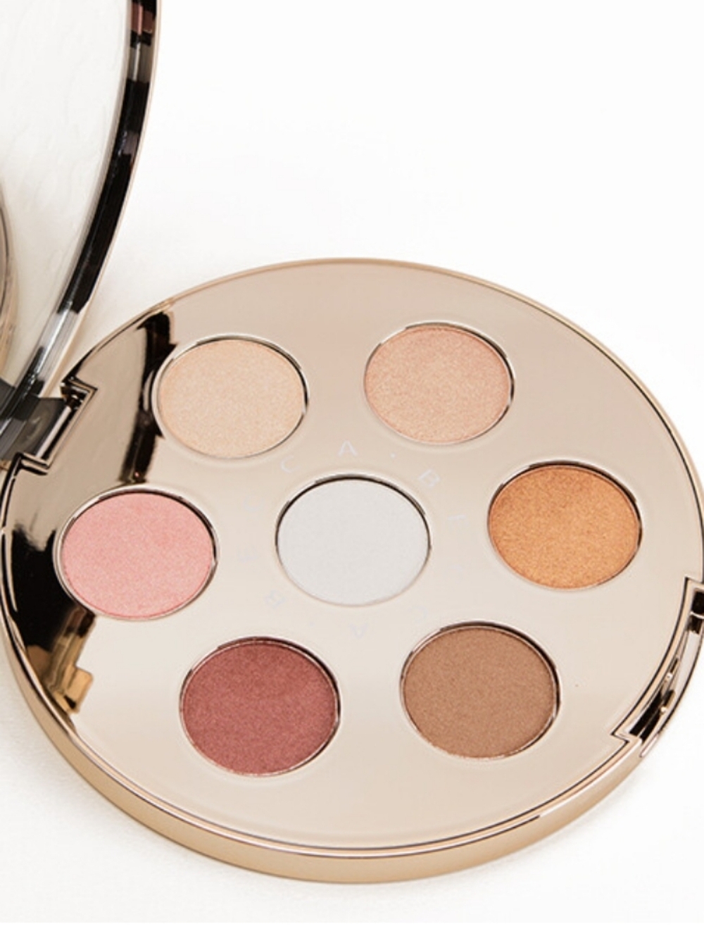 BECCA Eye Lights Seven-Shade Eye Palette — Pink, Champagne, Bronze